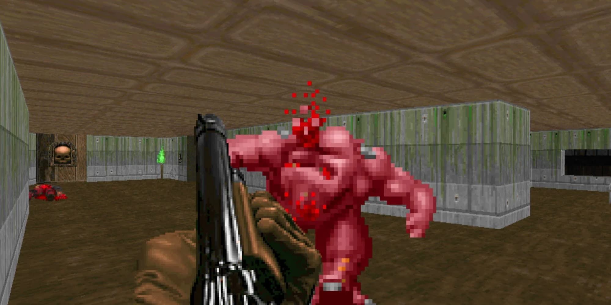 The player shoots a monster with a shotgun in the original Doom.