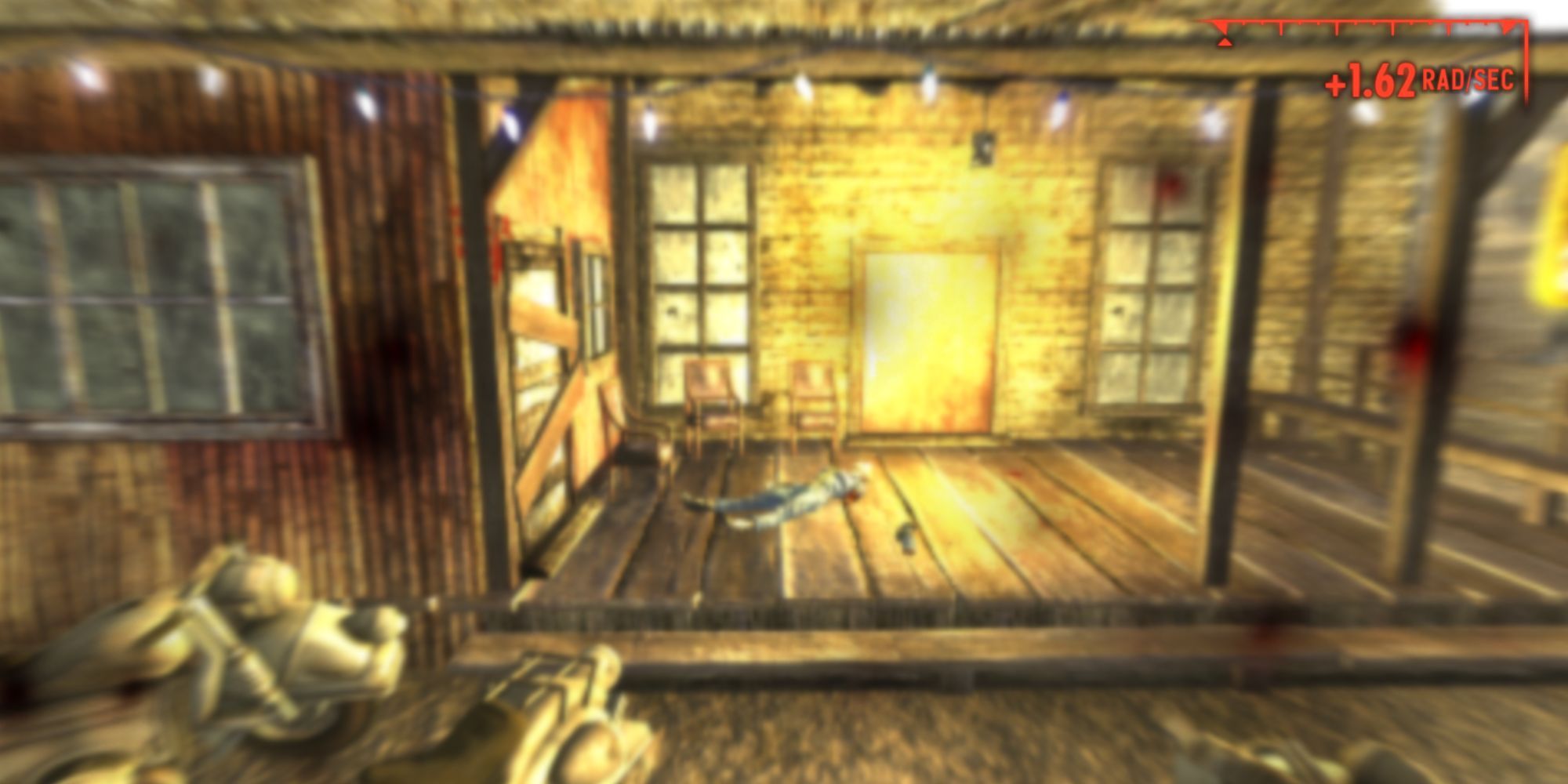 An explosion in Fallout New Vegas. A dead body is on the ground outside a tavern.