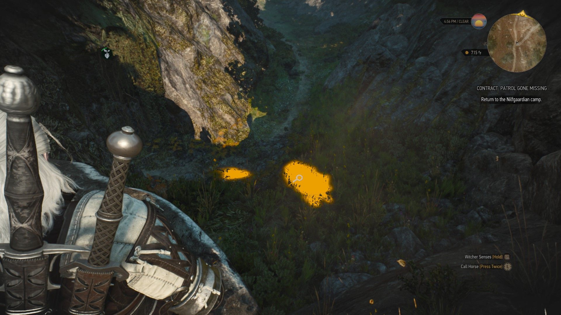 A screenshot showing Geralt's warlock senses highlighting a path through a narrow pass.