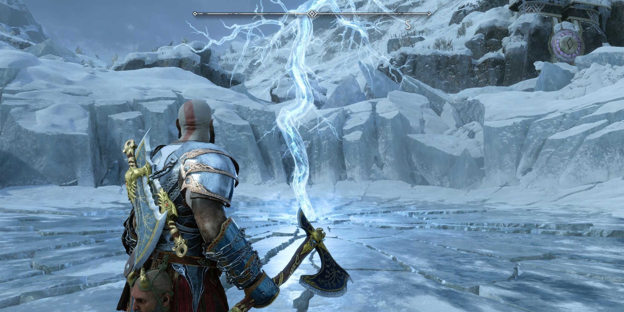 Kratos stands in the arena where you fight Thor earlier in the game.