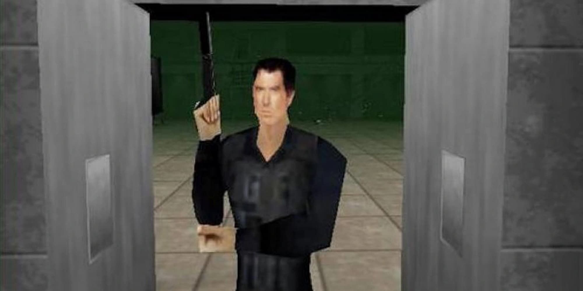James Bond stands in a doorway with a silenced pistol in GoldenEye 007.