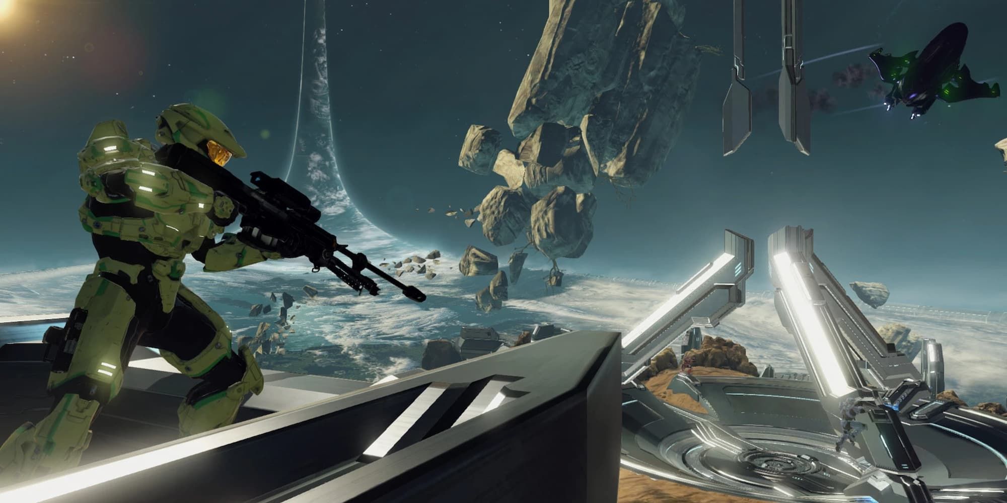 Master Chief stands on a platform with a sniper rifle as a Banshee flies by in Halo 2.