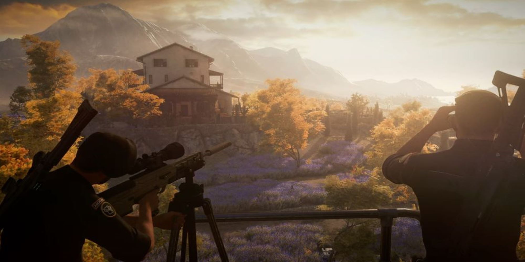 A coupe of snipers observing a house in the distance.