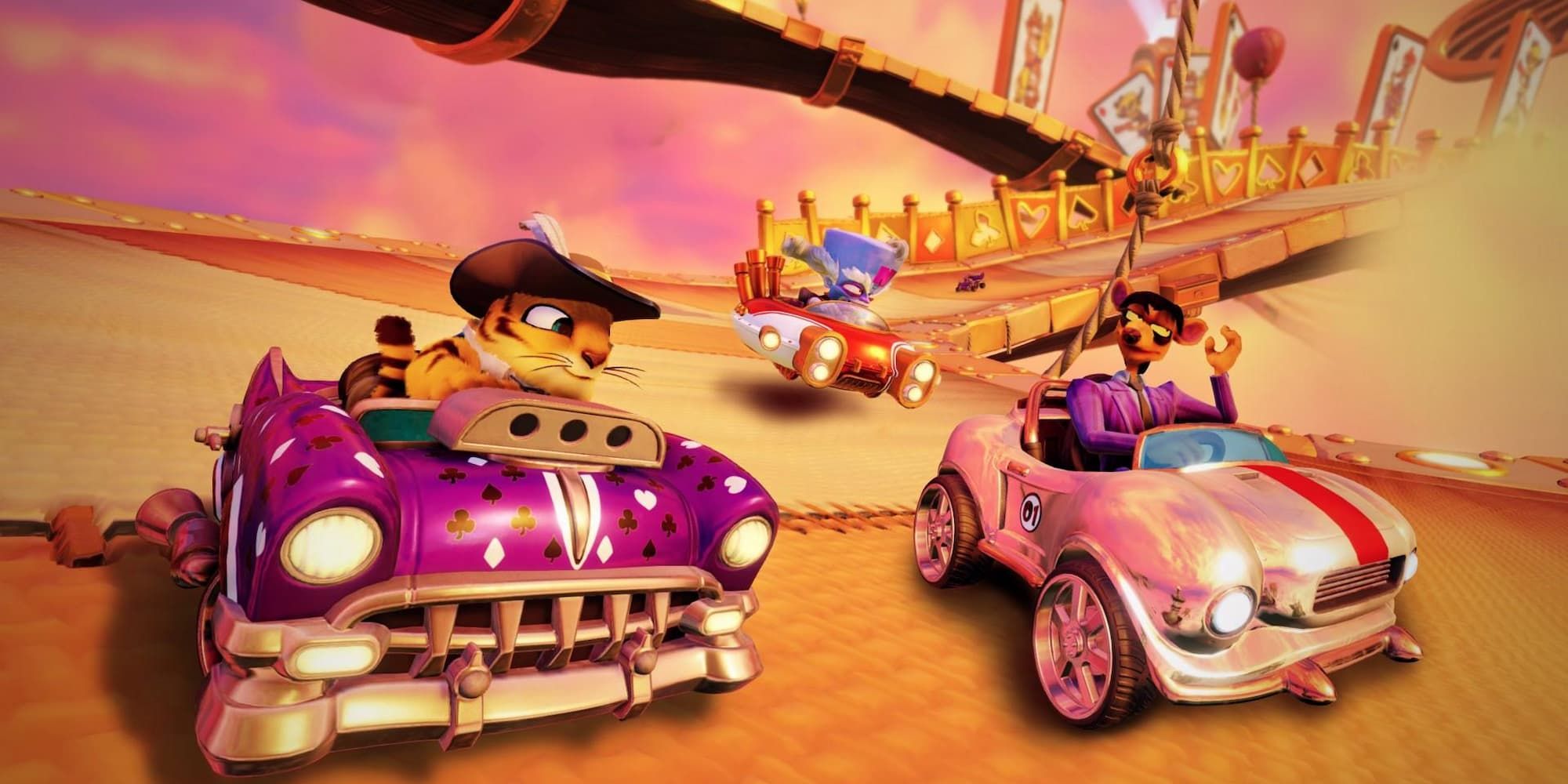 Three racers try and take the lead on Hot Air Skyway in Crash Team Racing - Nitro Fueled.