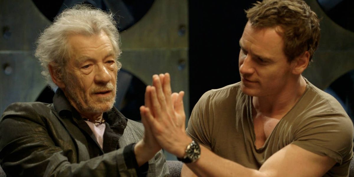 Ian McKellen and Michael Fassbender holding hands