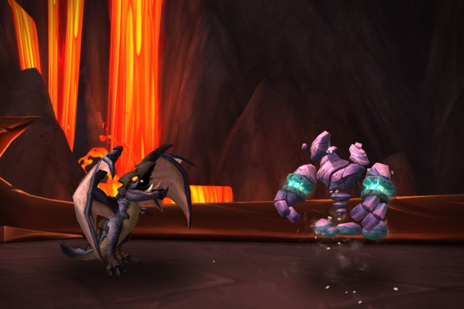 The elemental pet, Chip, and the Obsidian Proto-Whelp pets together beside lava.