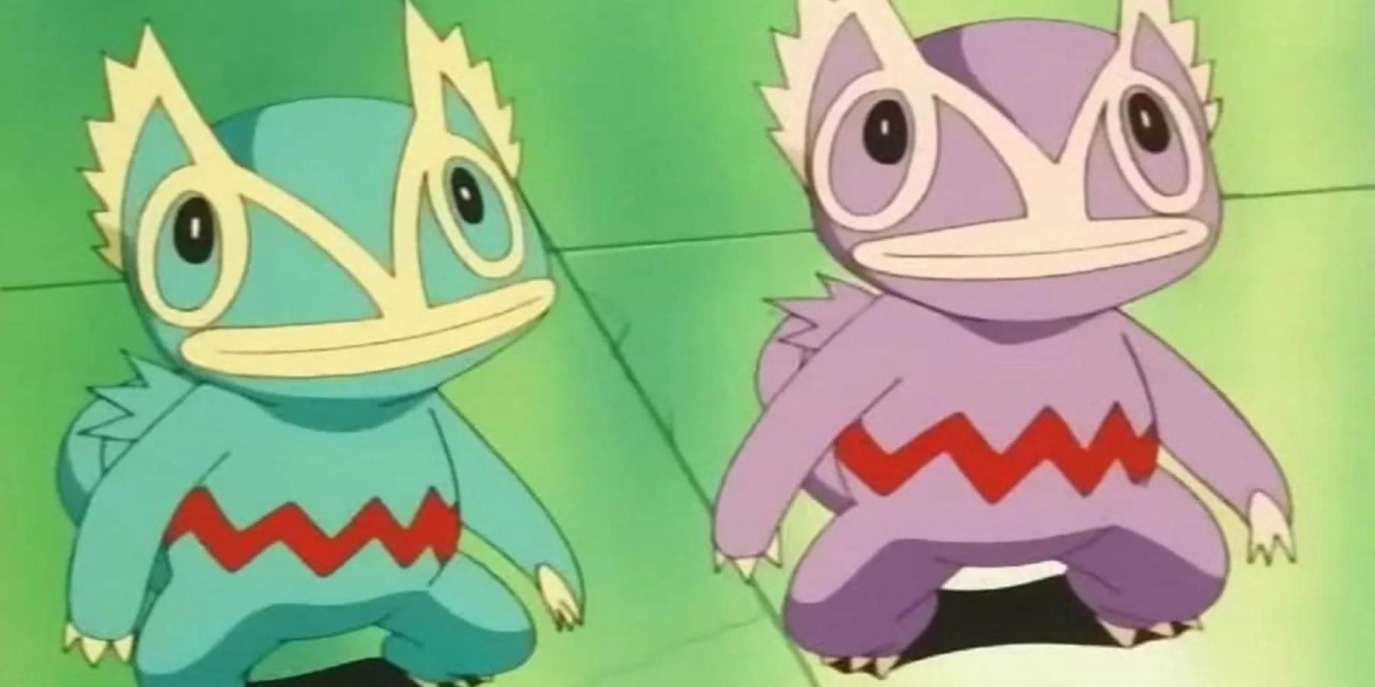 A green and a purple kecleon stand next to each other