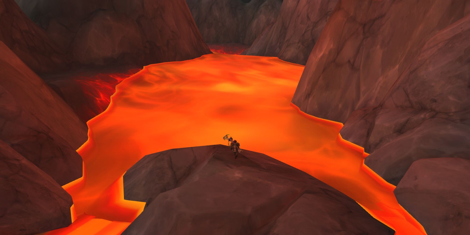 World of Warcraft character kneeling in front of lava pool at Scalecracker Keep