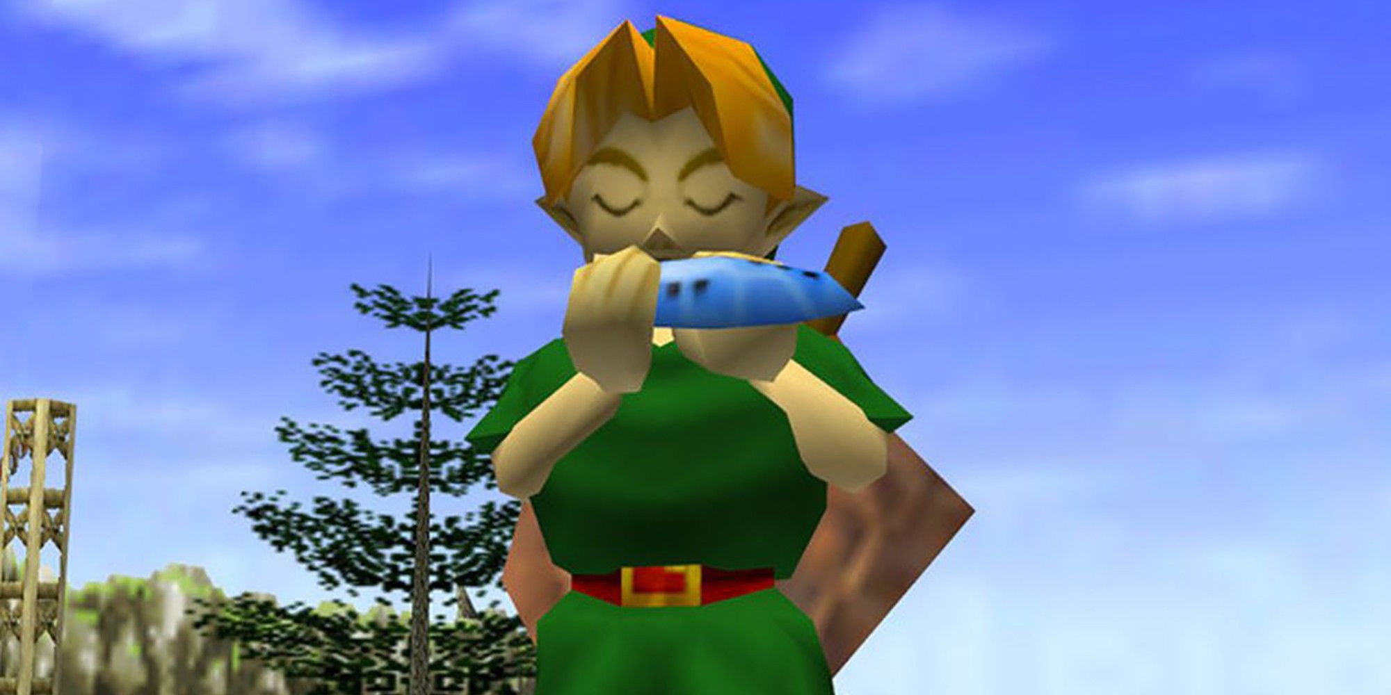 link holding the ocarina of time
