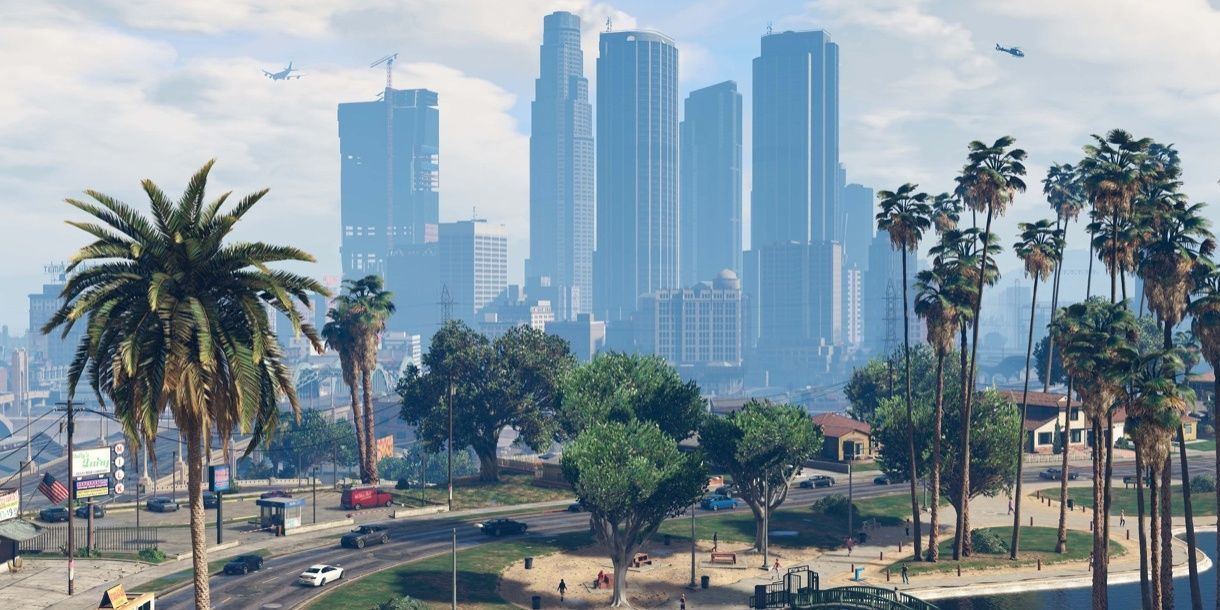 An overview of Los Santos, with cars, a beach and a neighborhood in the foreground, and skyscrapers in the background