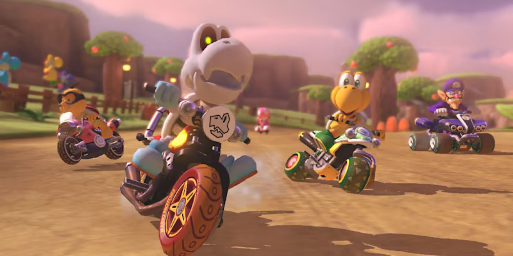 Dry Bones rides a motorcycle past a group of other racers