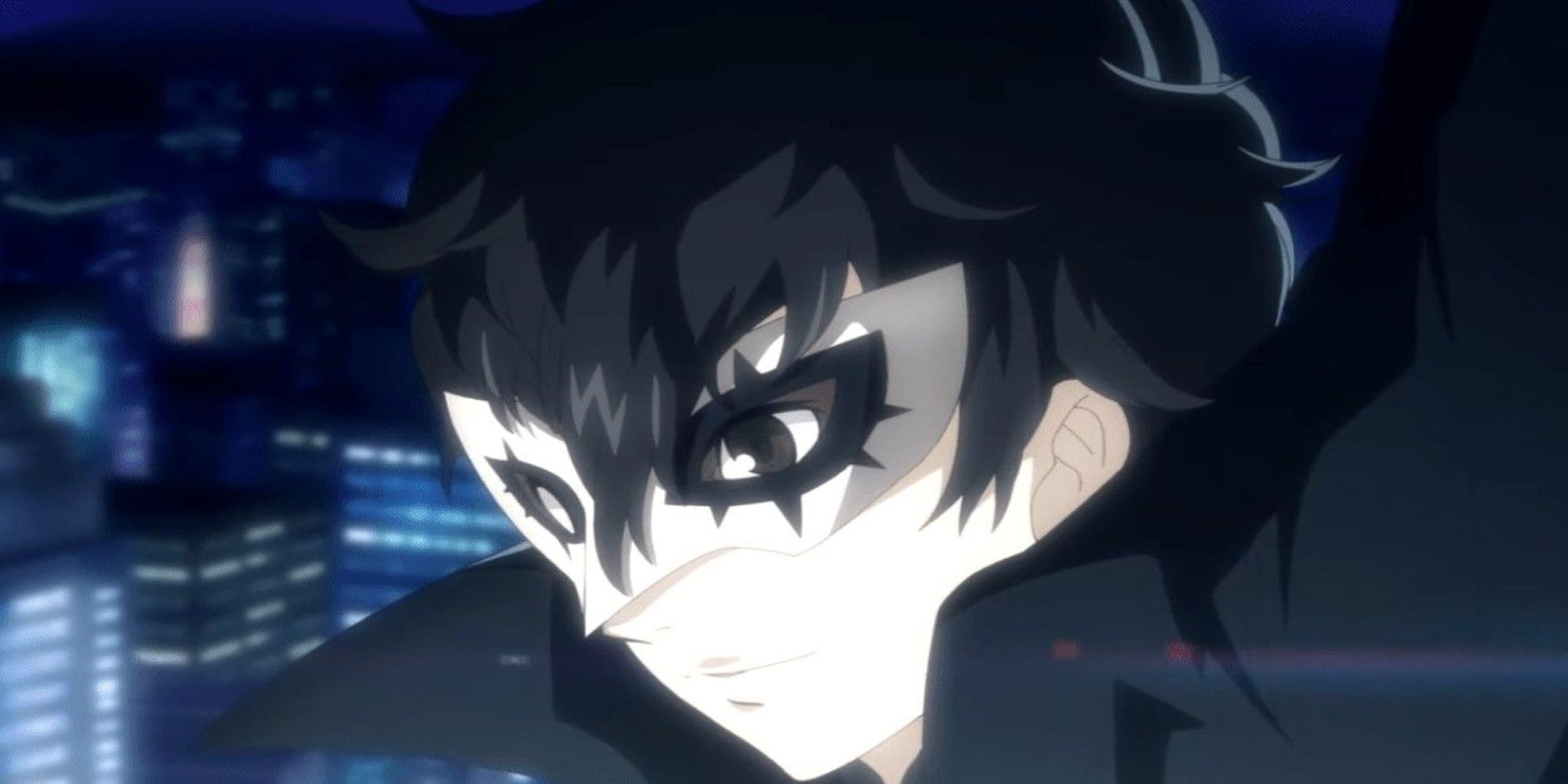 A close-up of Joker from Persona 5 Royal against a cityscape backdrop.