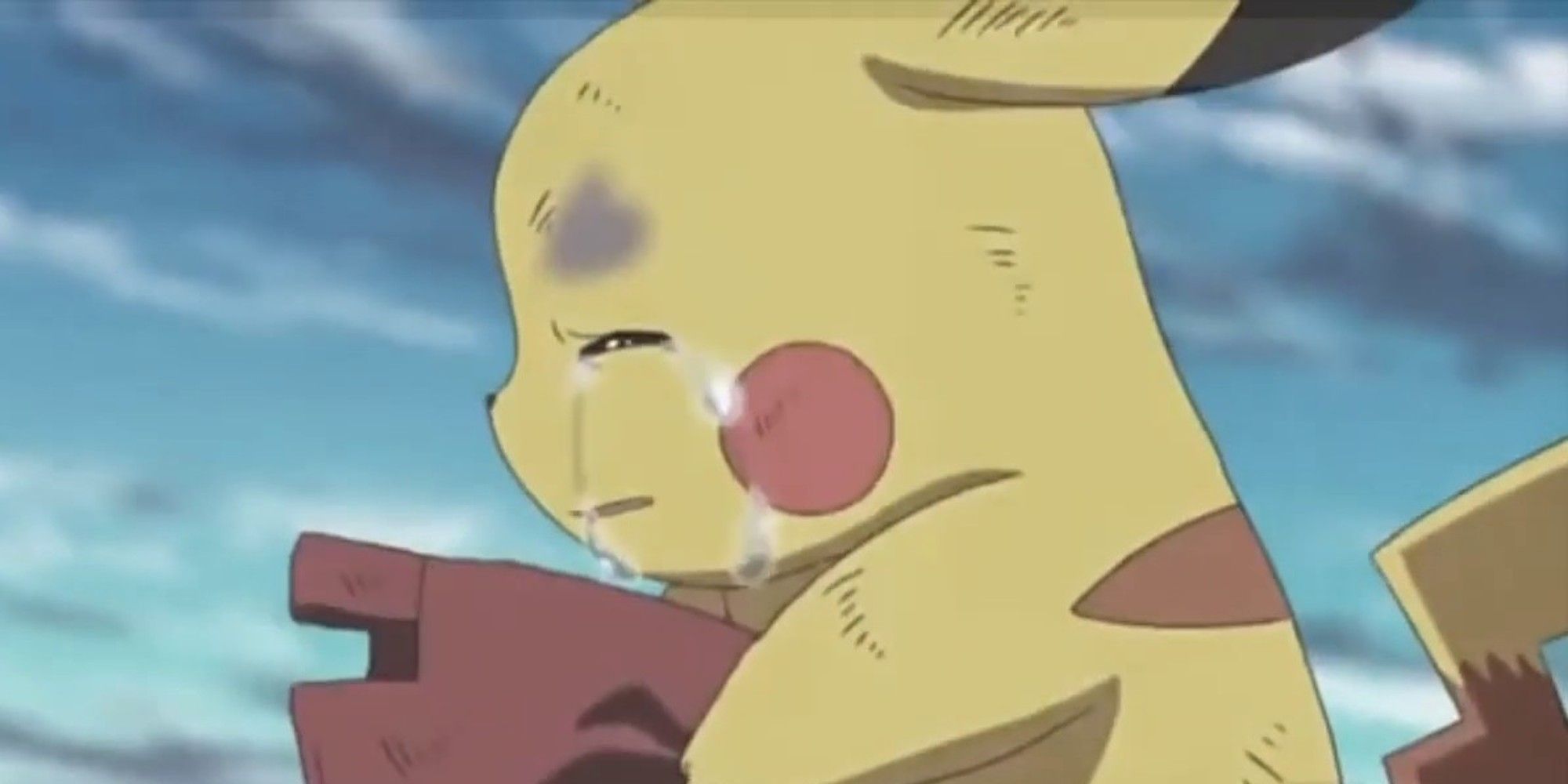 pikachu holding ash's hat and crying