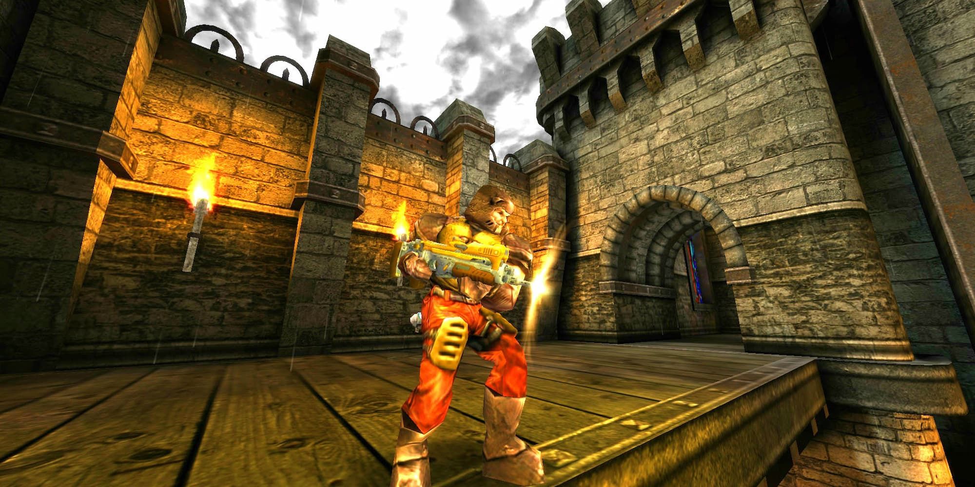 A player fires from the top walkway of a castle in Quake 3 Arena.