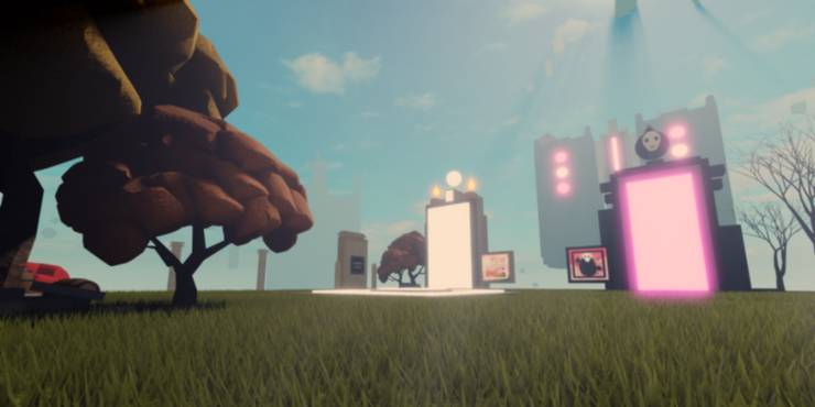 A field of grass holding two large, square portals that lead further into the level