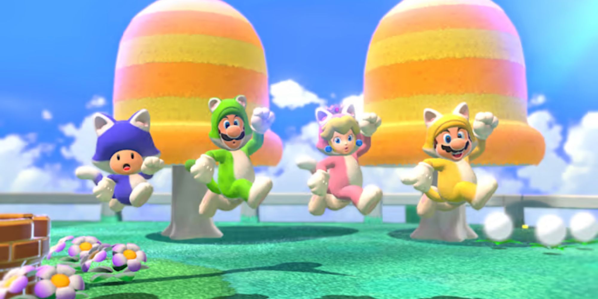 Cat Toad, Cat Luigi, Cat Peach, and Cat Mario jump after clearing a level