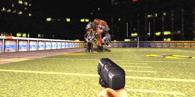 The Cycloid Emperor shooting at Duke from Duke Nukem 3D.