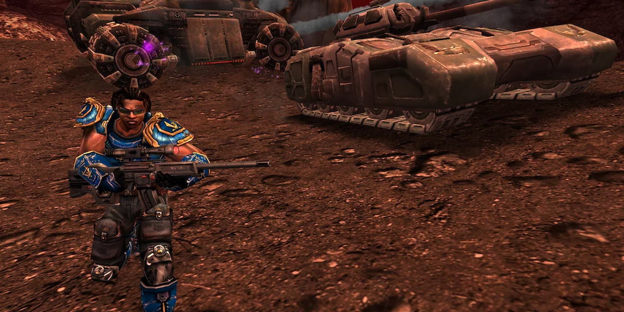 A soldier rushes into battle with two tanks behind him in Unreal Tournament 2004.