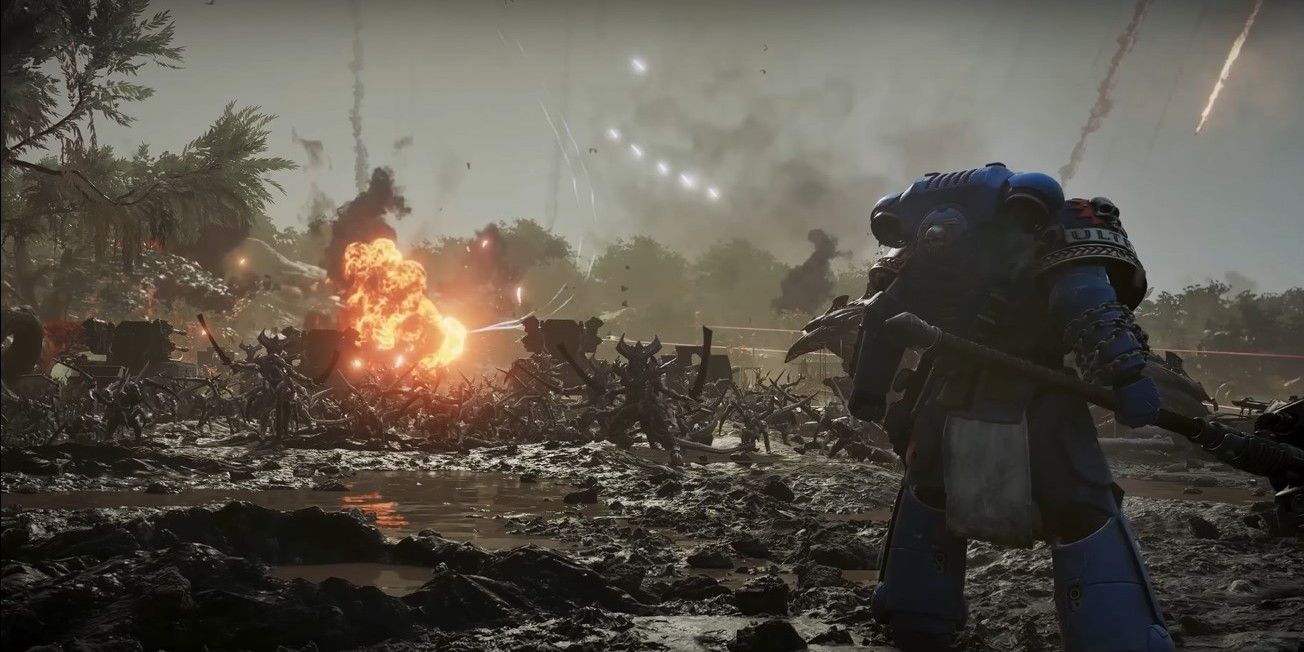 Warhammer 40K: Space Marine staring down tyranids while holding a thunderhammer