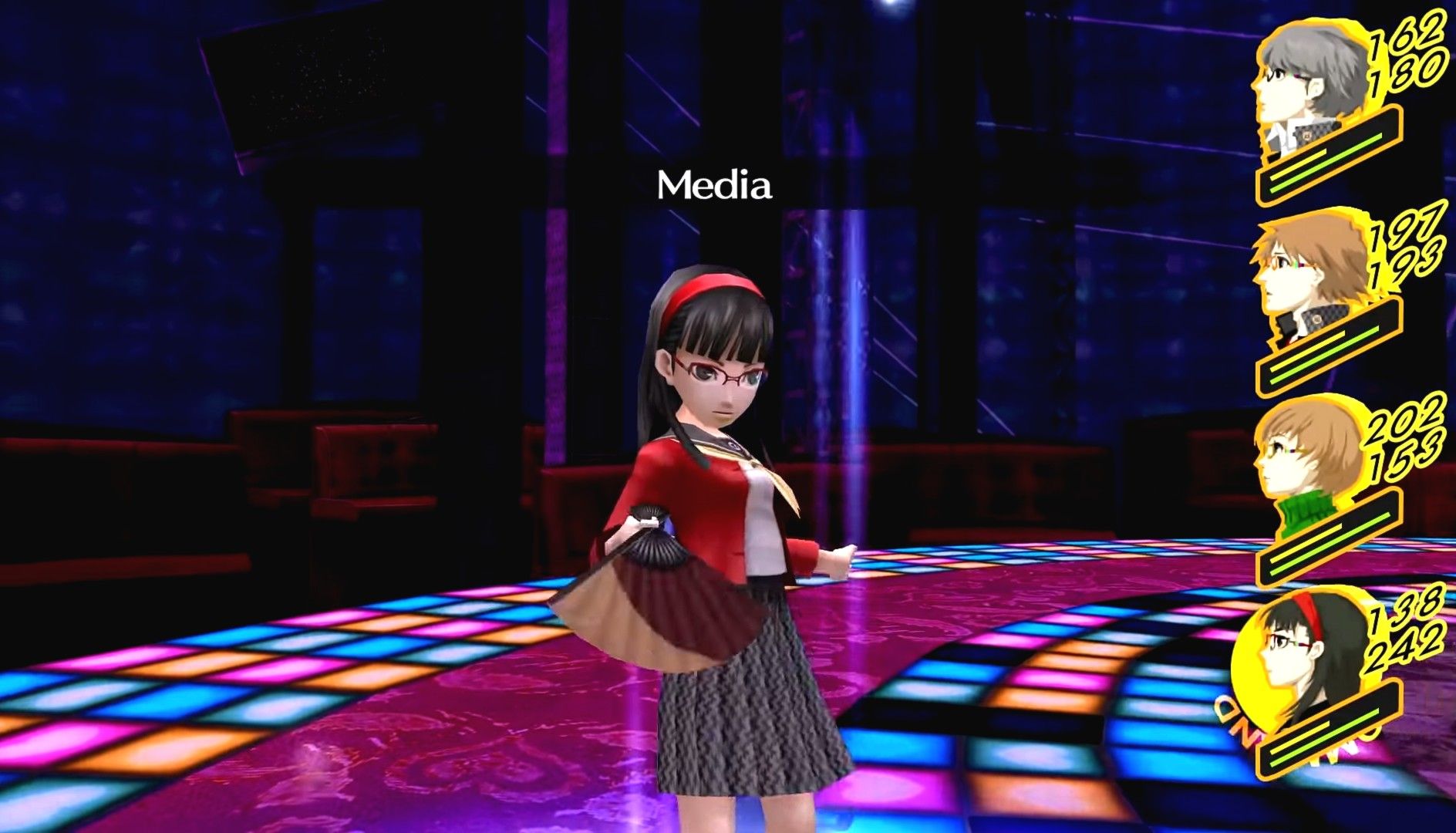 yukiko using her healing skill media in battle with shadow teddie in persona 4 golden