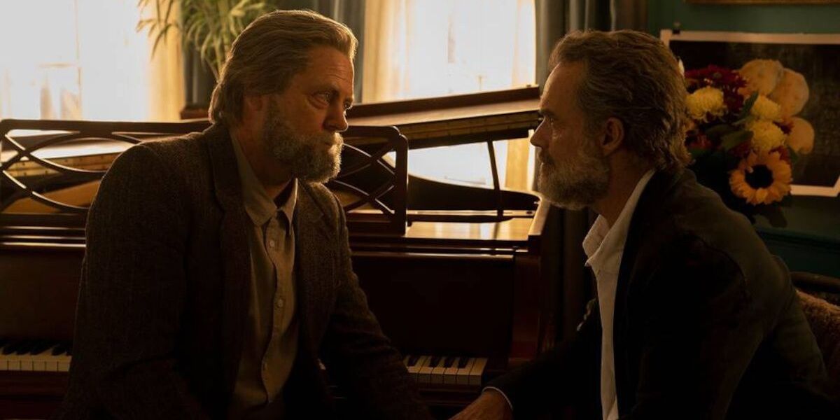 Bill and Frank in tuxedo suits before their final supper, comforting one another and being reassuring by the piano. 