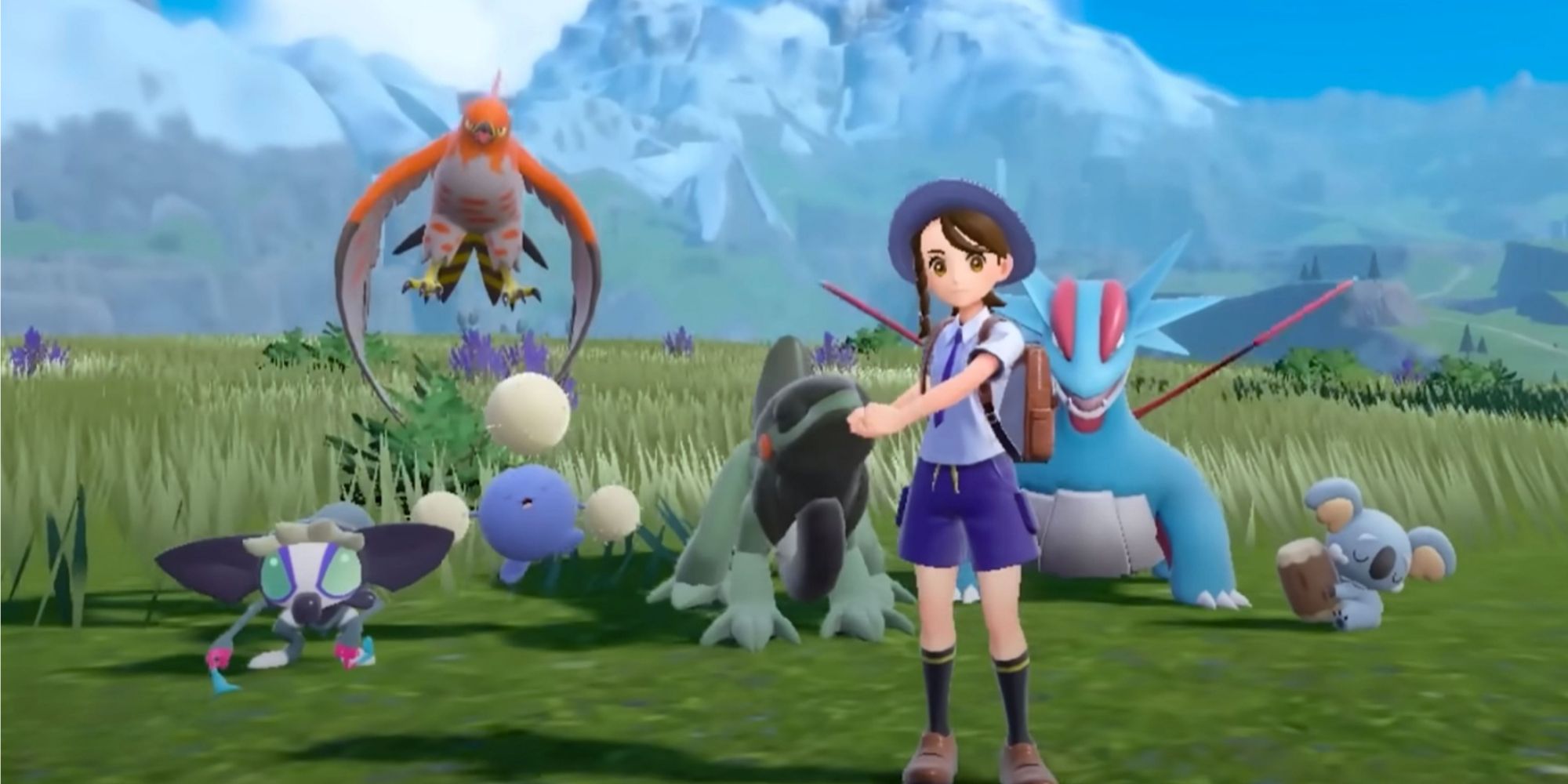 pokemon trainer with their pokemon in scarlet and violet