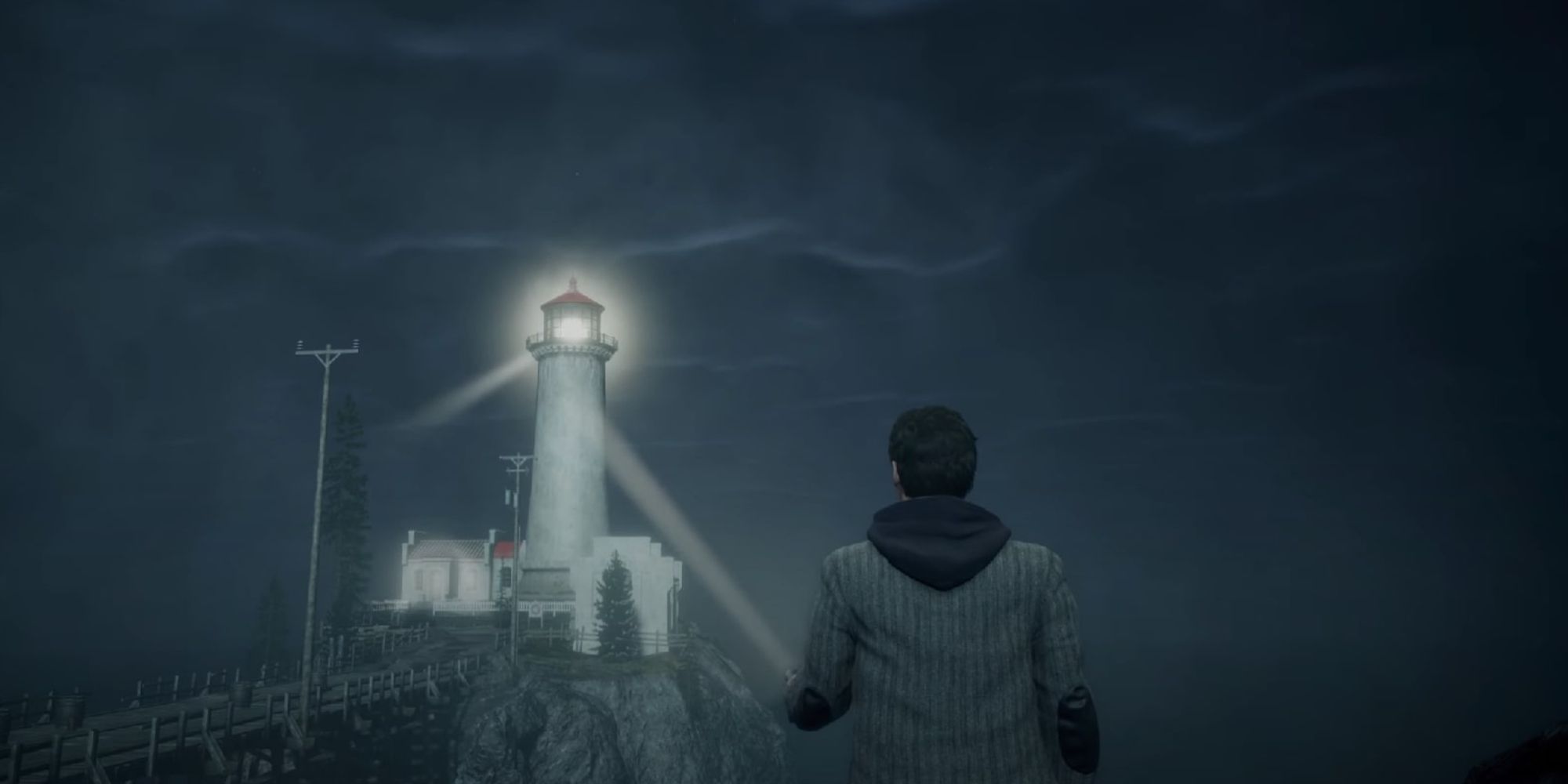 Alan Wake shining his flashlight at the Rain Cove Point Lighthouse across the bridge as its beam spins.