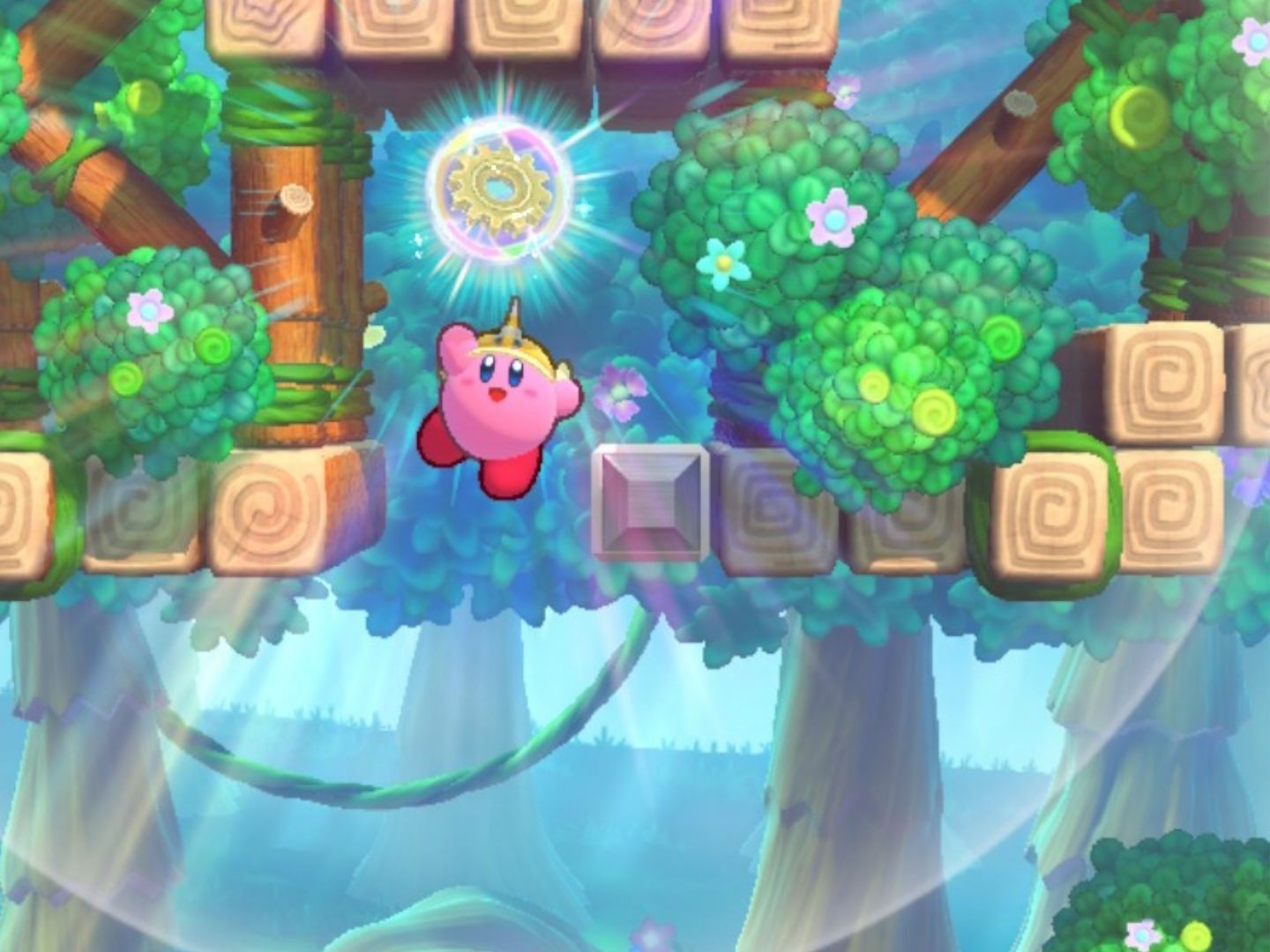 Kirby jumps up to receive an Energy Sphere.