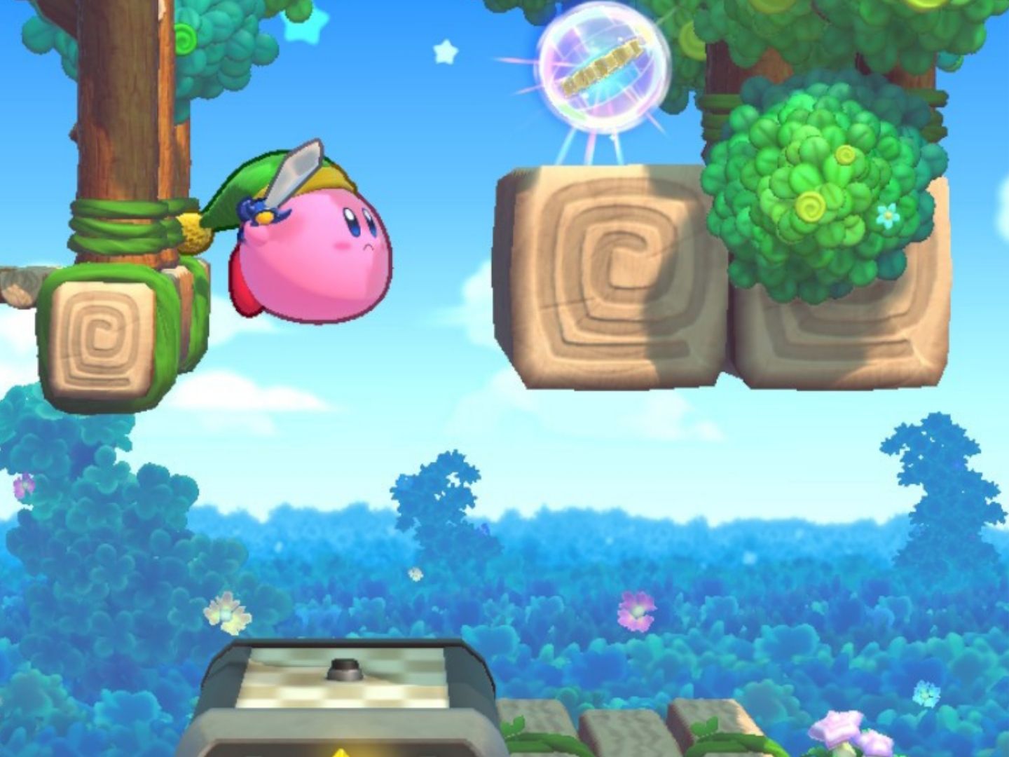 Kirby floats up to an Energy Sphere on the right.