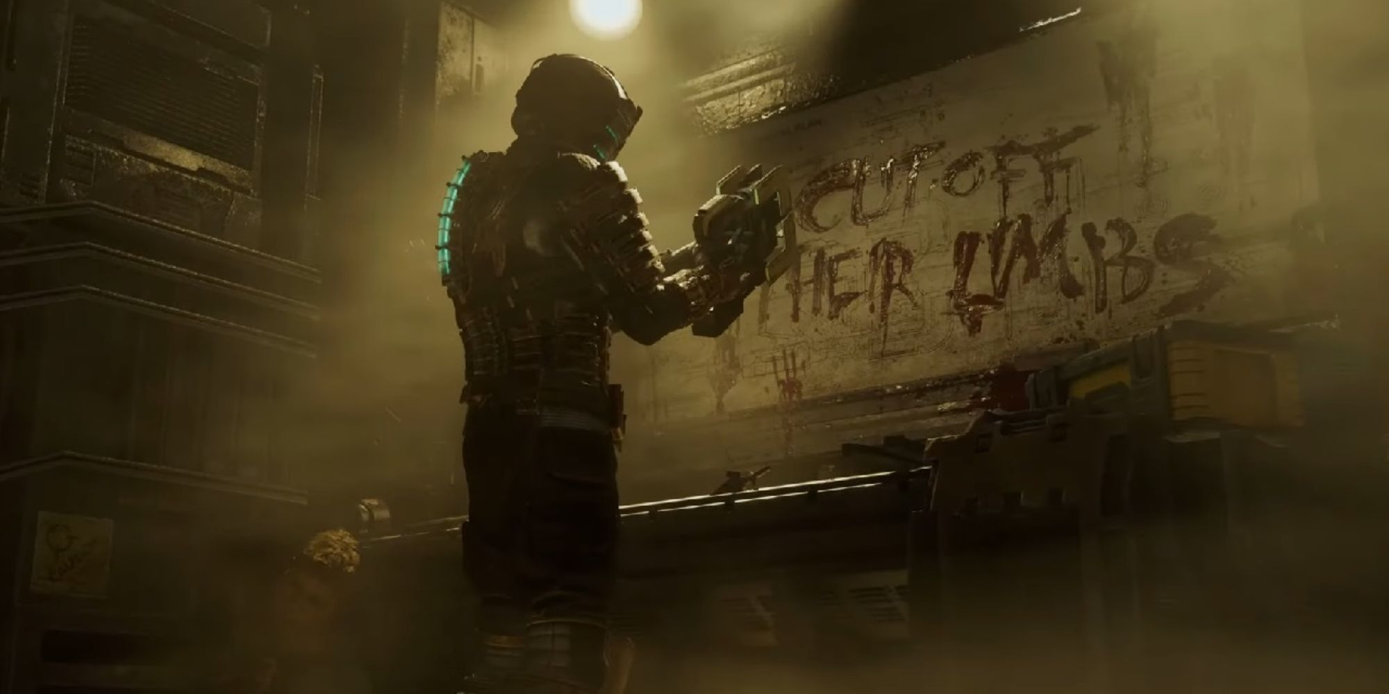 Dead Space isaac standing in front of "cut off their limbs" written in blood on the wall