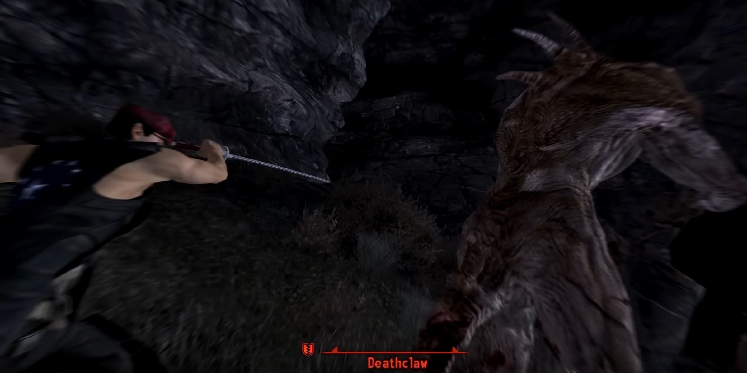 The main character peforming the Unlabored Flawlessness special attack on a Deathclaw. The move is done with a reverse grip sword swing