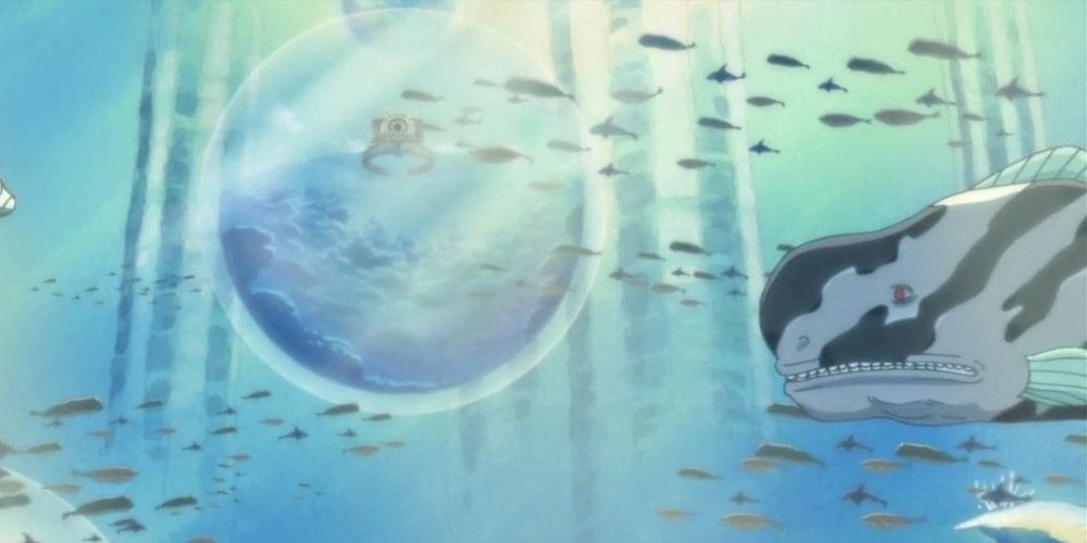 Fish surround an underwater island in the One Piece anime