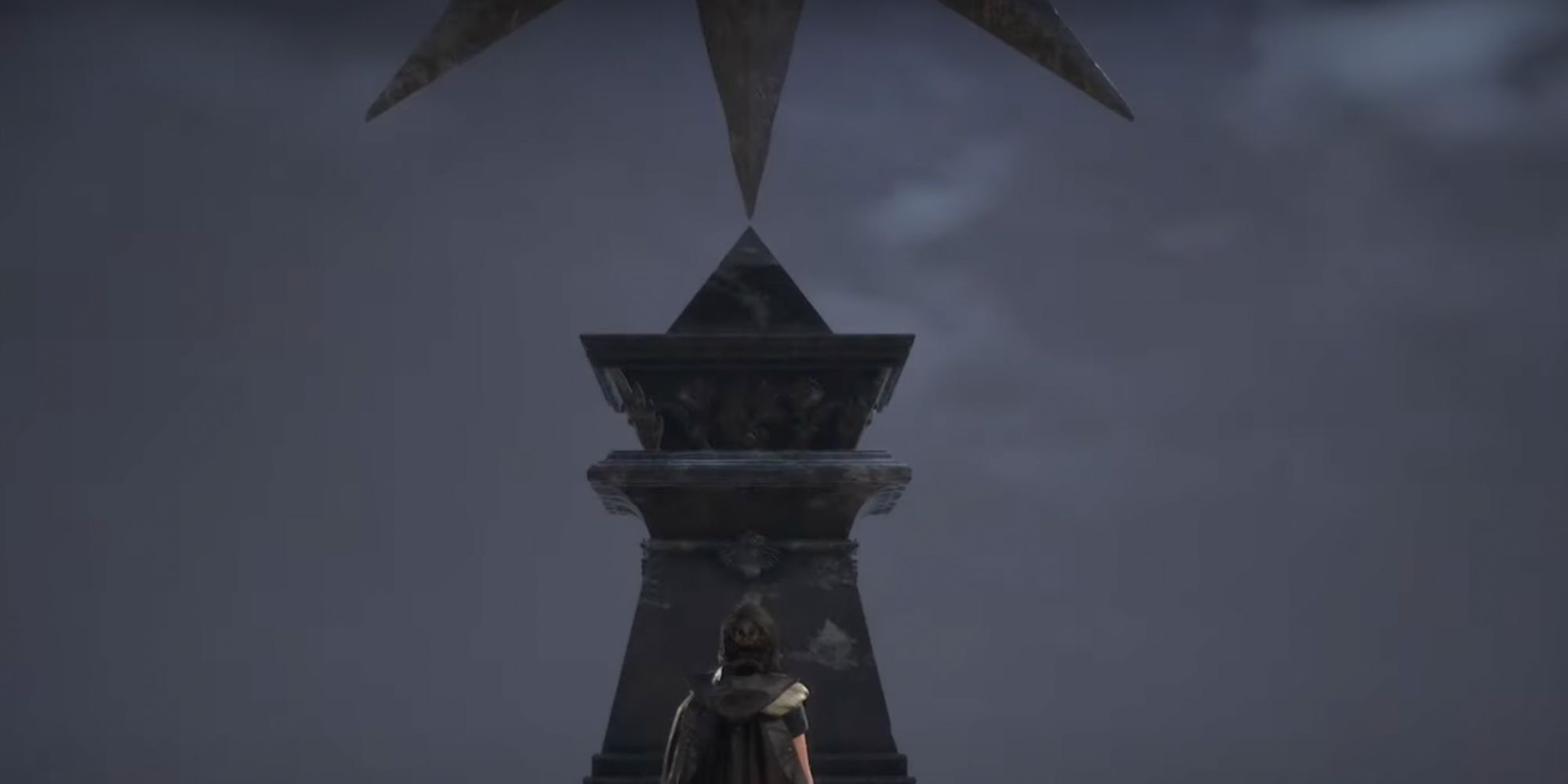 forspoken frey stands in front of tanta monument