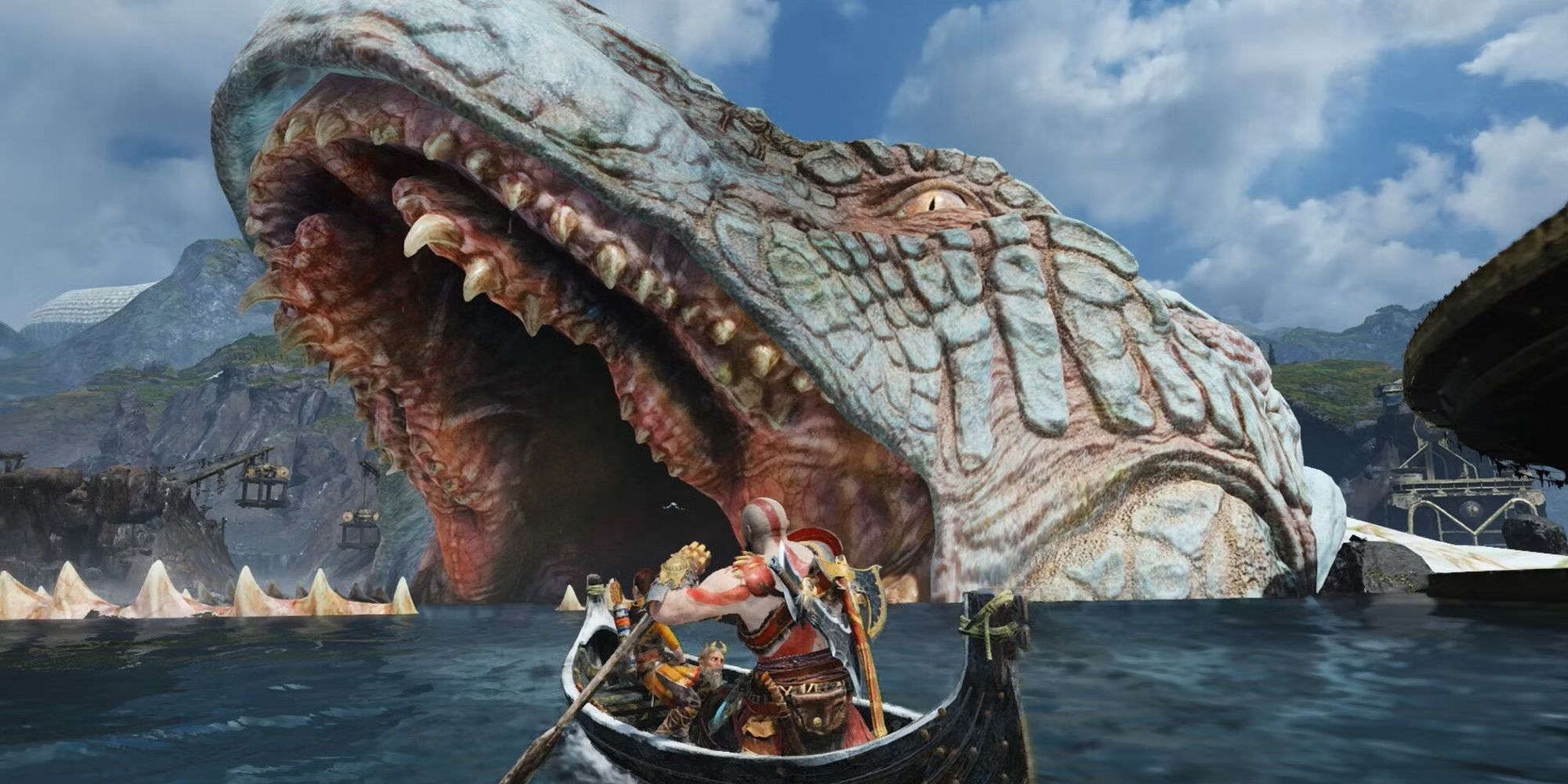 Kratos and Atreus paddling their boat into the open mouth of Jörmungandr in God of War