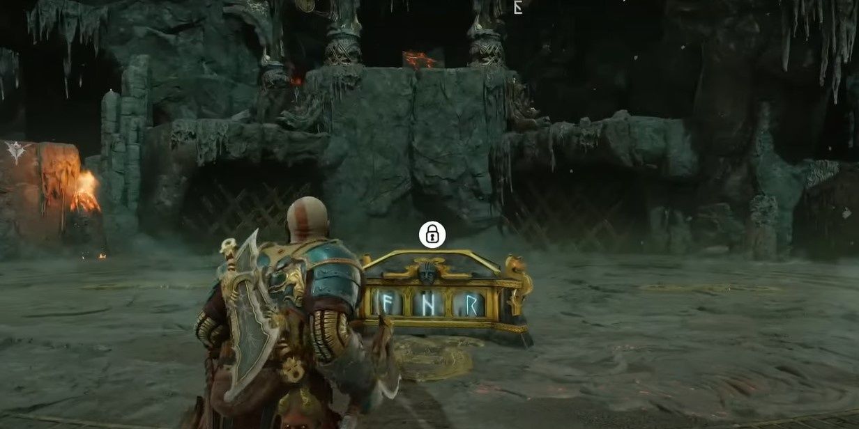 Kratos in the Crucible in Muspelheim in front of a Nornir chest