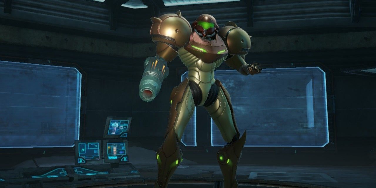 Metroid Prime Remastered screenshot of Samus Aran in the Varia suit in front of a computer monitor