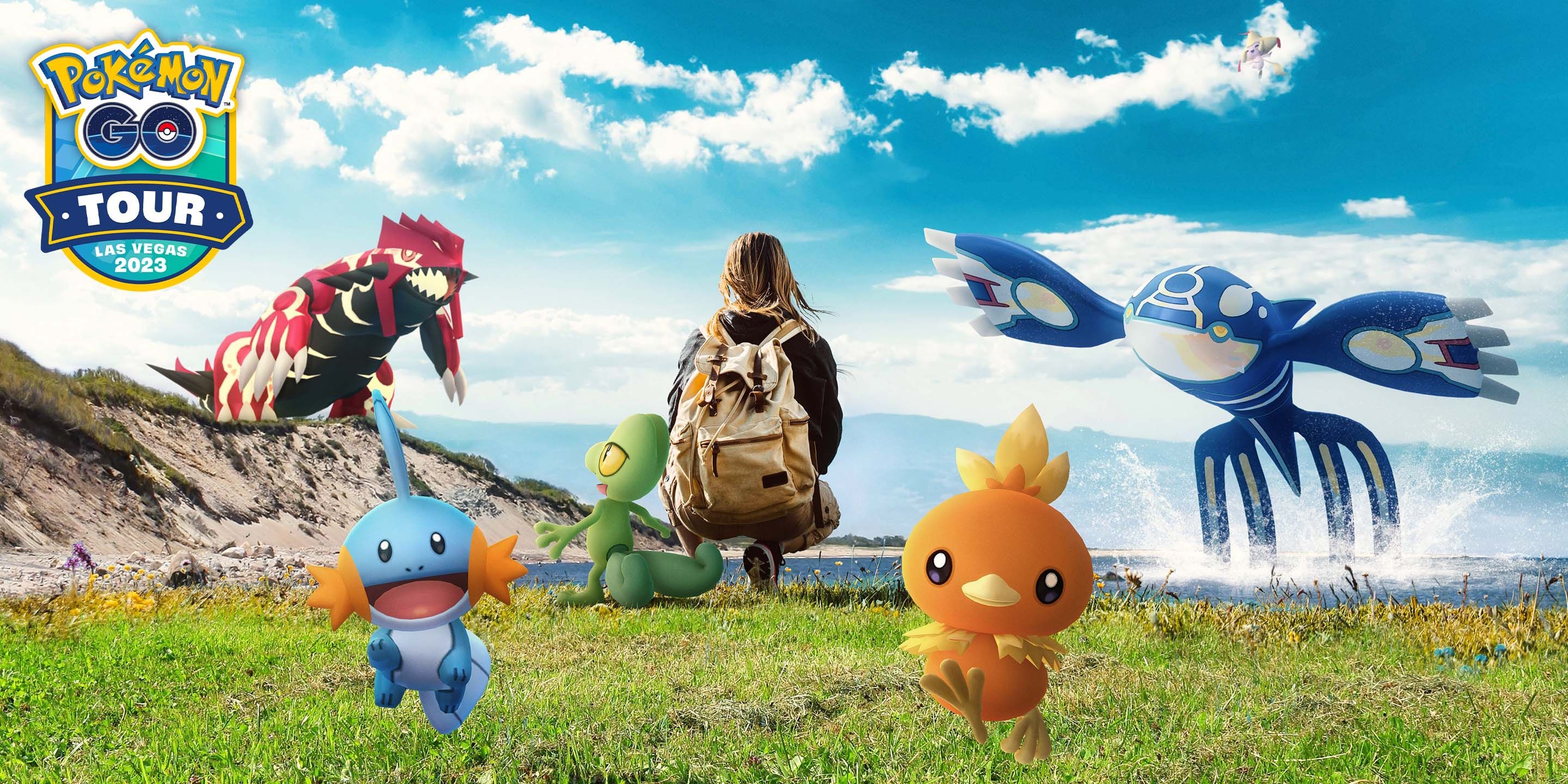 Someone kneeling in a field with Primal Groudon, Mudkip, Treecko, Torchic, and Primal Kyorgre