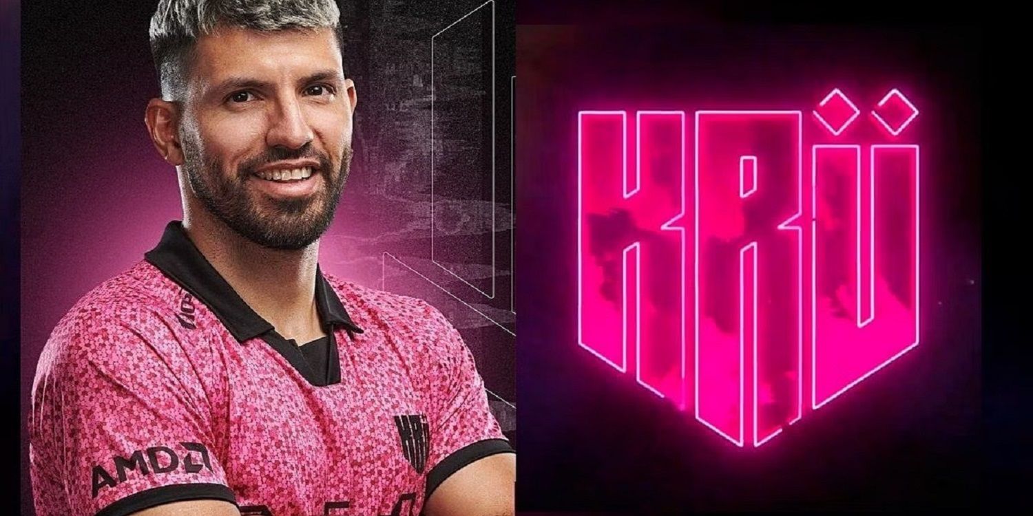 sergio aguero poses next to the kru esports logo