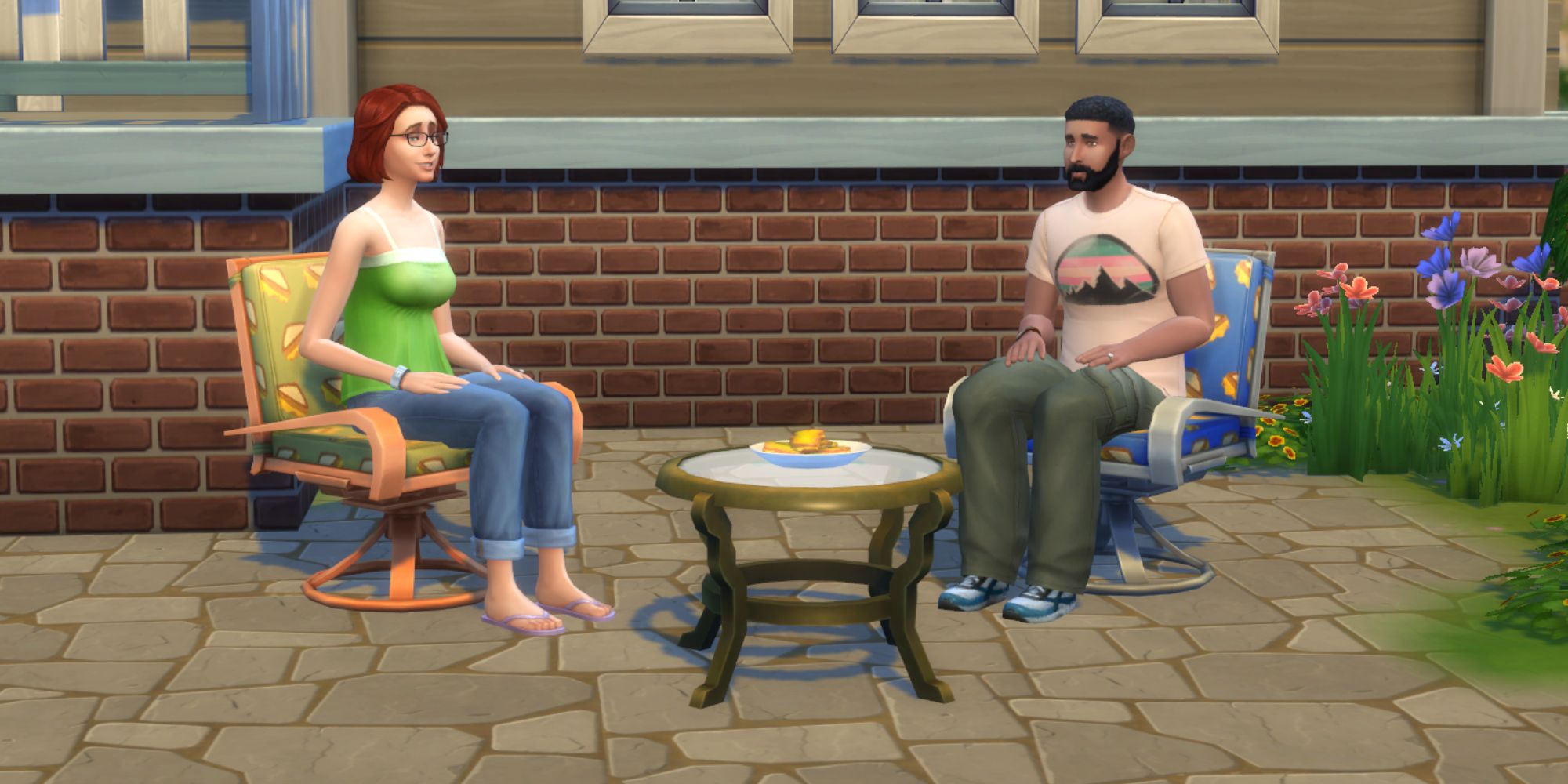 Sims 4 Eliza and Bob Pancakes sat on grilled cheese chairs by a plate of grilled cheese