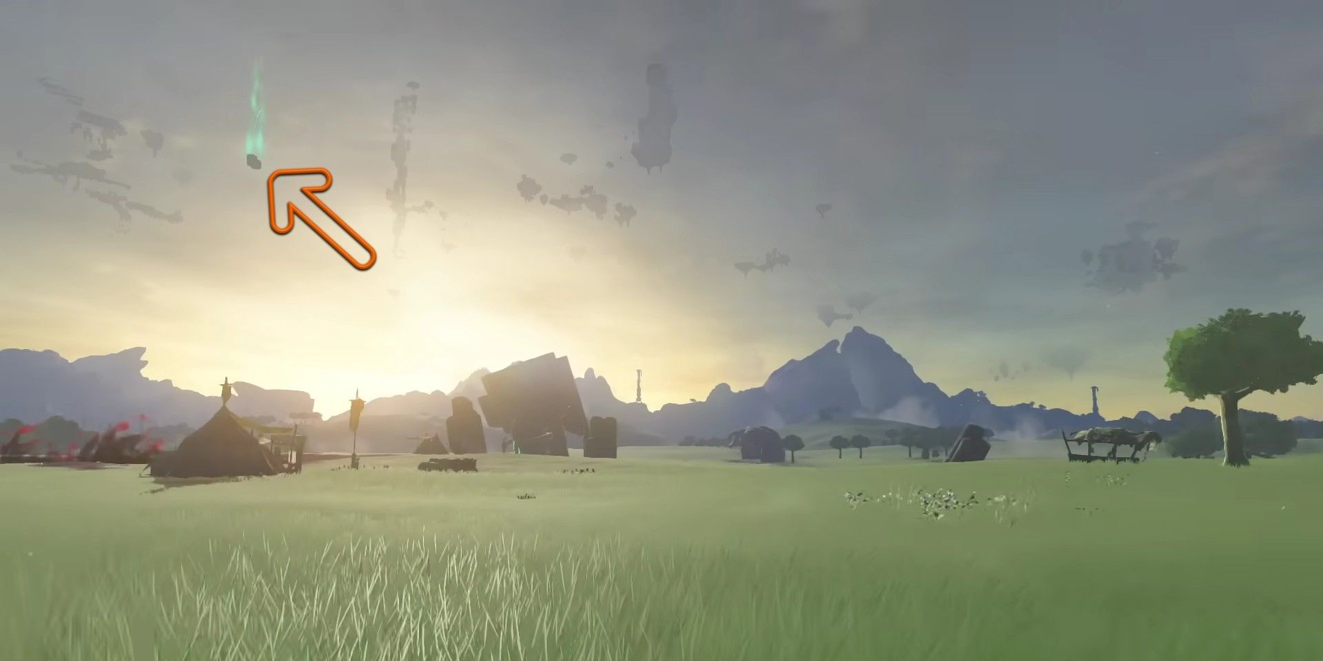 Tears of the Kingdom screenshot showing a vast section of Hyrule, with an arrow pointing toward a chunk of falling debris