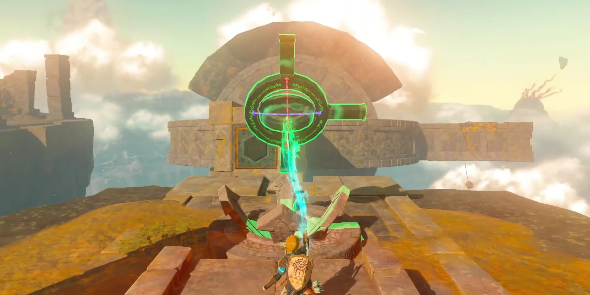 Tears of the Kingdom screenshot showing Link using a rotating device to manipulate a large portion of a floating island