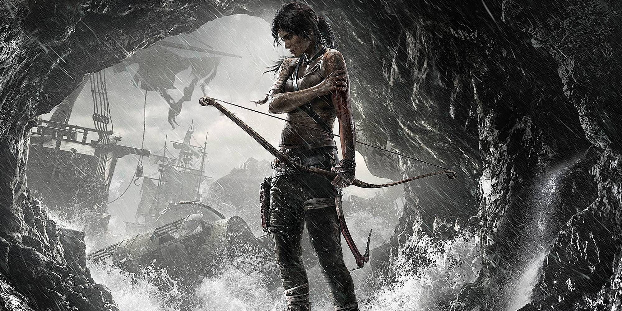 Lara Croft poses in a cave in the main image of Tomb Raider 2013