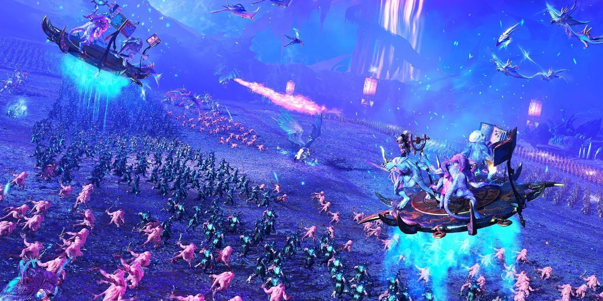 Total War Warhammer 3 Screenshot Of Large Scale Battle With Blue Atmospheric Lighting And Flying Creatures