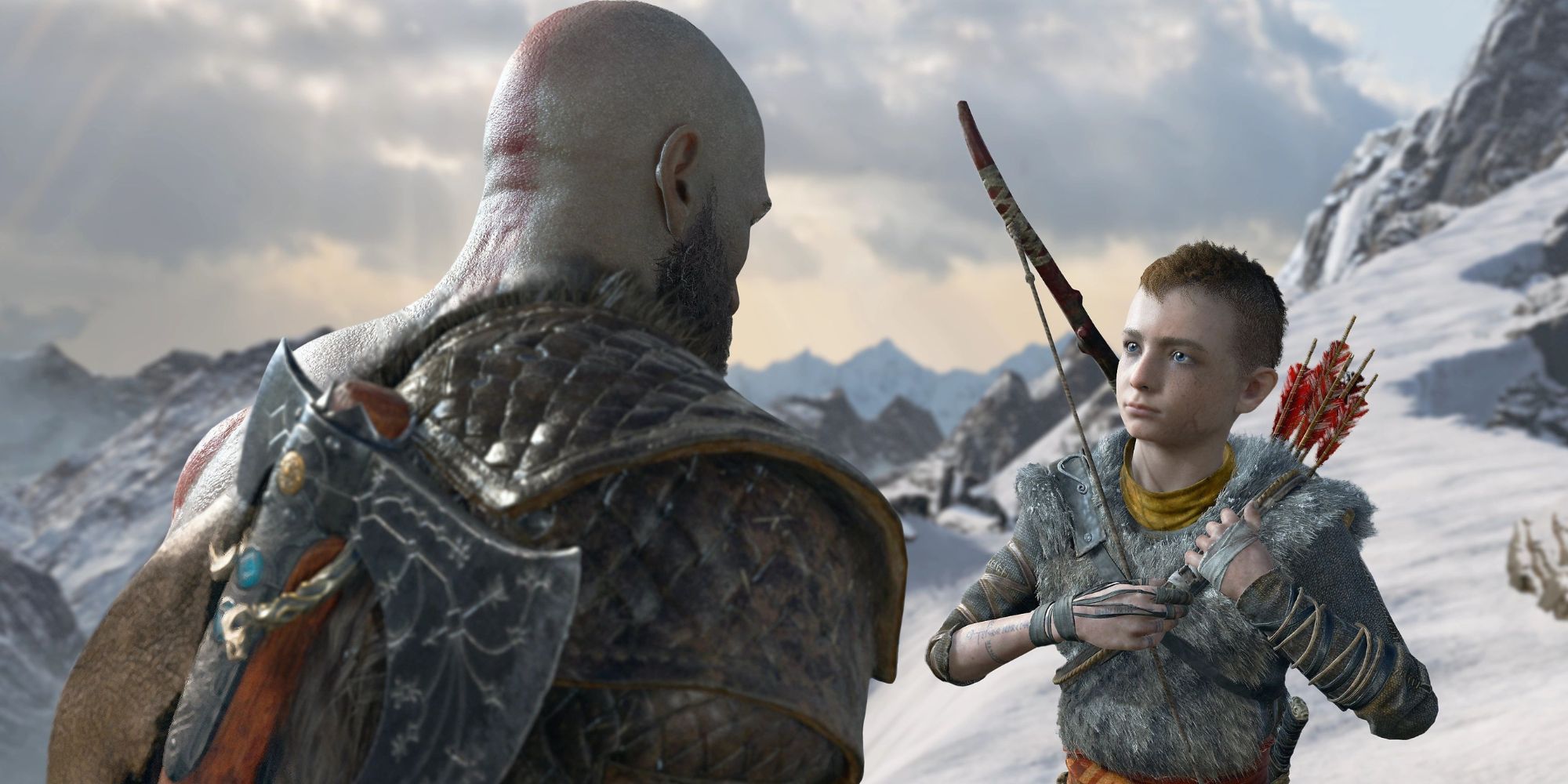 Kratos talking to Atreus in God of War on a snowy pass on a mountain 