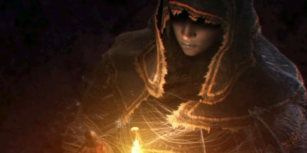 The Witch of Izalith tending to a flame in Dark Souls the video game