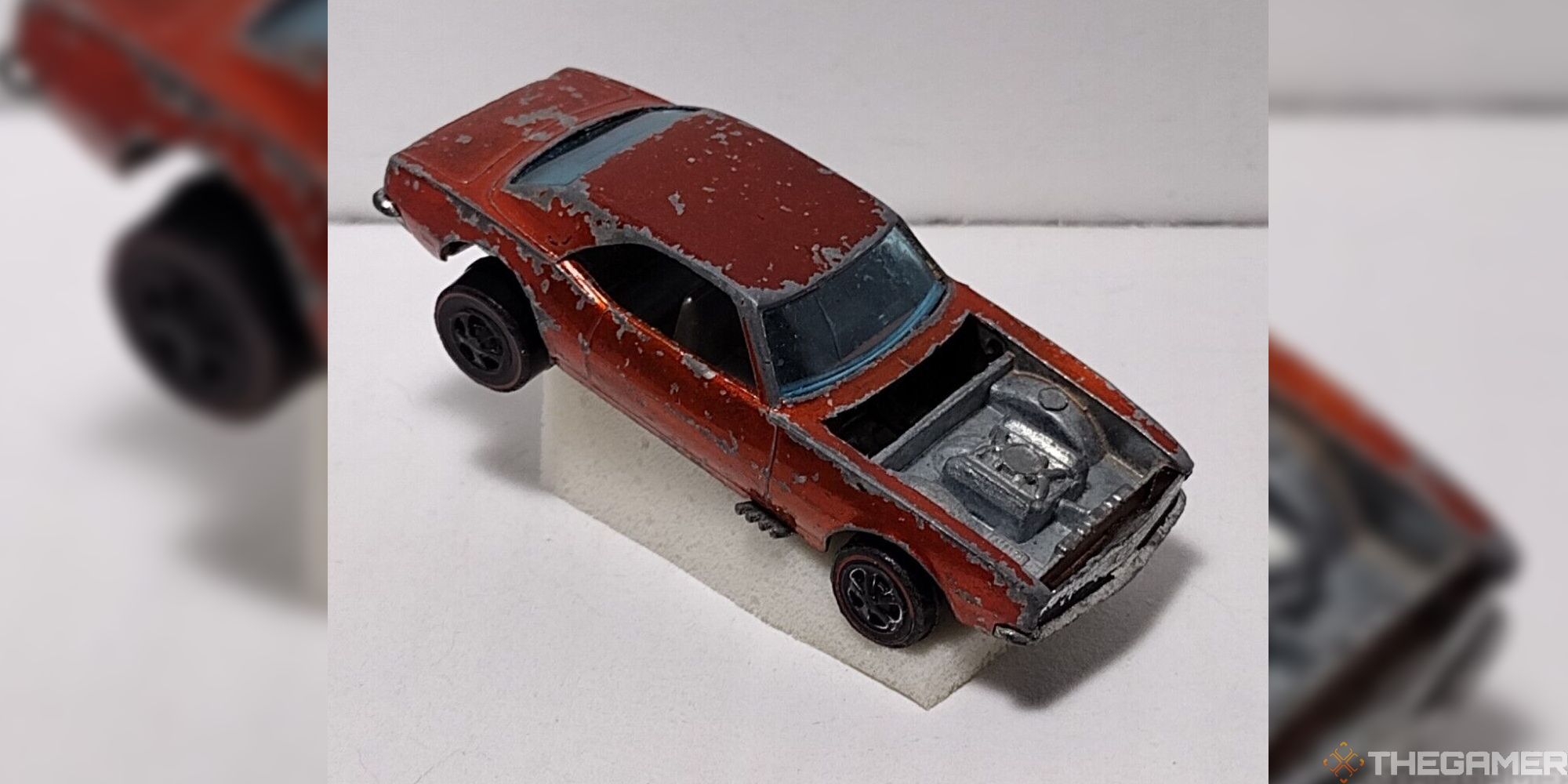 1968 Brown Custom Camaro hot wheels on stand