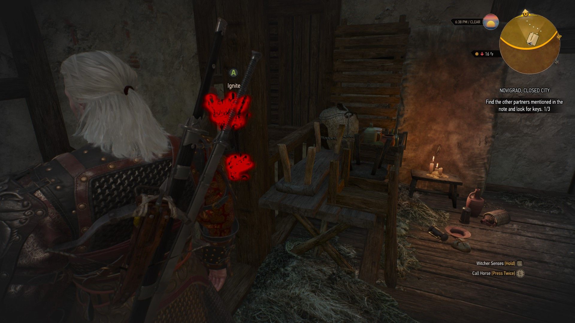A screenshot of The Witcher 3 showing a piece of furniture highlighted in red by Geralt's Witcher Senses.