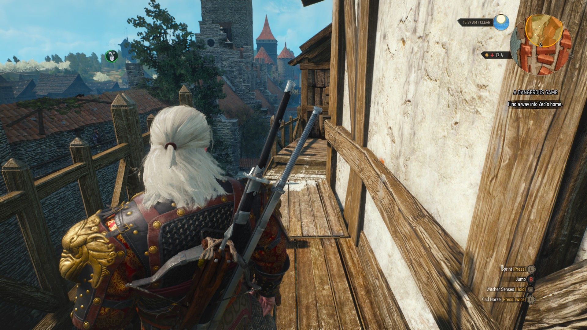 A screenshot of Geralt, wearing ornate red-and-gold armor, looking at a path between houses in Novigrad.