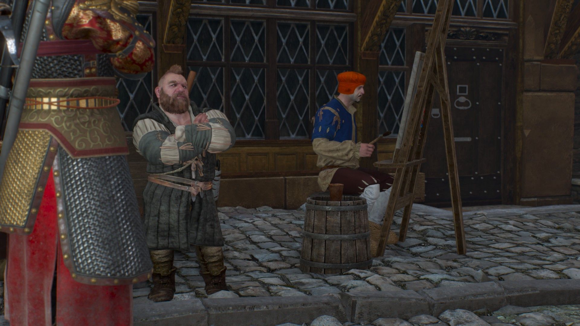 Geralt and Zoltan speak, both crossing their arms, outside a well-decorated townhouse in Novigrad.  A painter in blue clothes and a red cap is in the background.