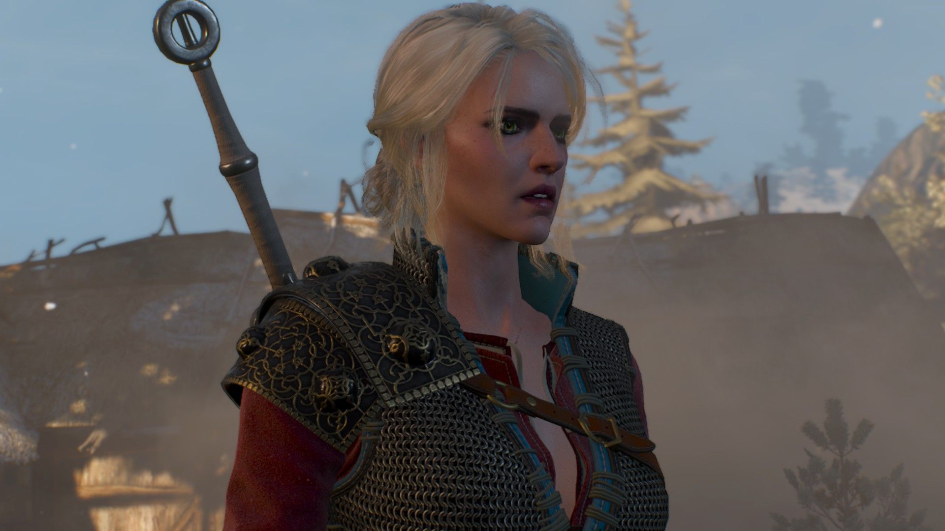 Ciri stands in a burning Skelliger village with a shocked expression while wearing her armor. 